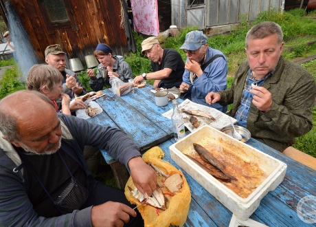 Sharing traditional meal with the locals during the trip to Baikal © Ivo Dokoupił for Barents.pl Active Travel Agency